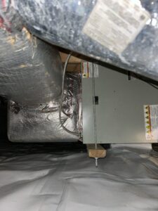 the inside of a building with duct tape on the floor