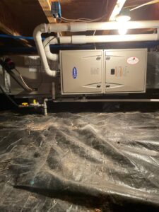 a picture of a hot water heater installed in a basement