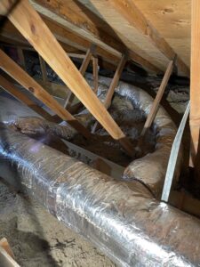 a room with a lot of wood and duct tape on the floor