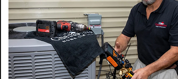 man working on an hvac system
