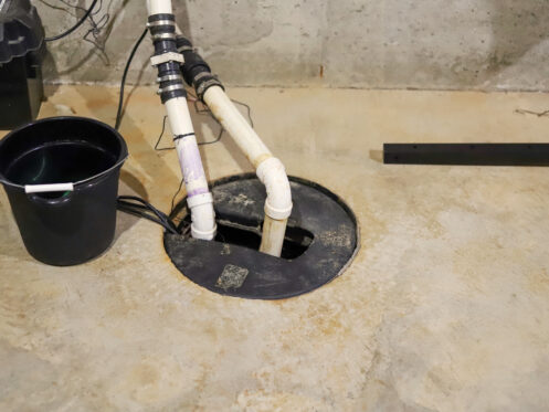 A sump pump in a home basement
